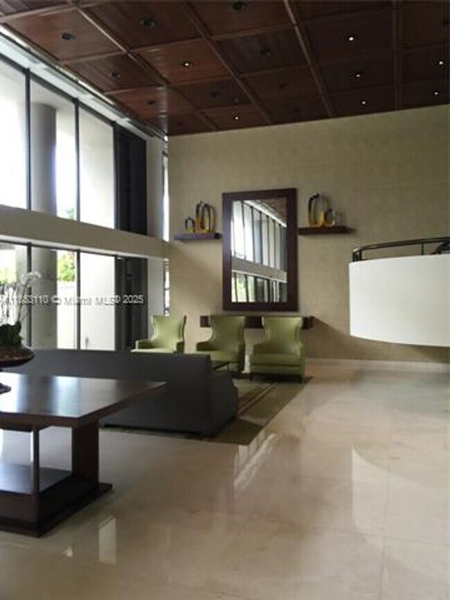 Building Photo - 20191 E Country Club Dr