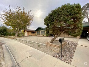 Building Photo - Updated 4 bed, 2 bath home with Dual Cooli...