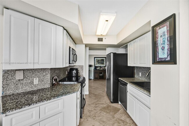 Building Photo - 6301 Collins Ave
