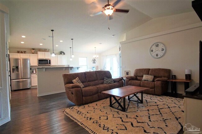 Building Photo - Popular Floor Plan, Almost New Home in Woo...