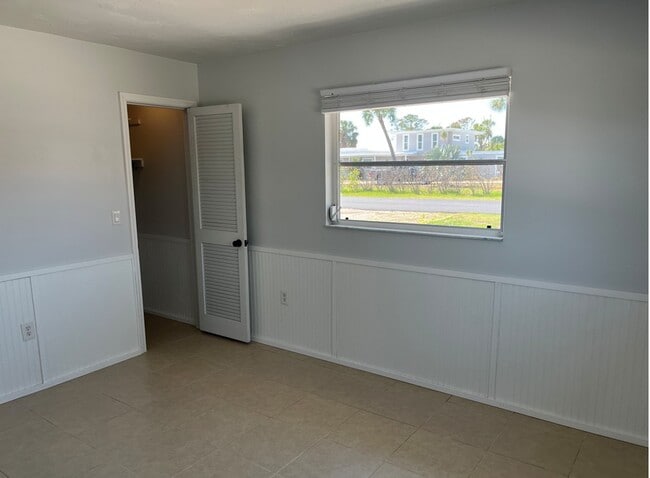 Building Photo - Lost in Paradise USA LLC