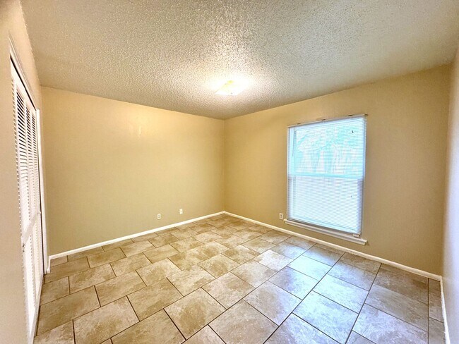 Building Photo - Single-level living on ground floor  |  Fresh paint (July 2026)  |  2 carports  |  Community Pool...