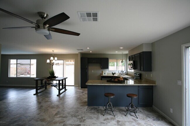 Building Photo - 5841 W Angela Dr