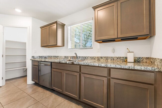 Building Photo - Modern Gated Townhome Living with Resort-Style Community Amenities