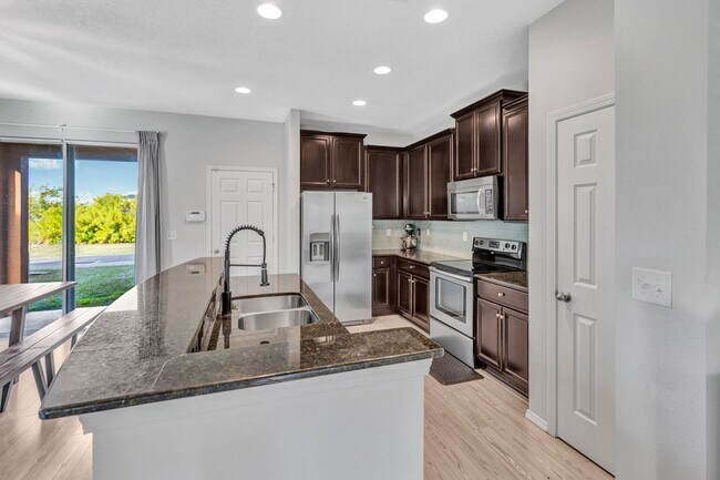 Building Photo - Partially furnished 3-bedroom, 2.5-bath home