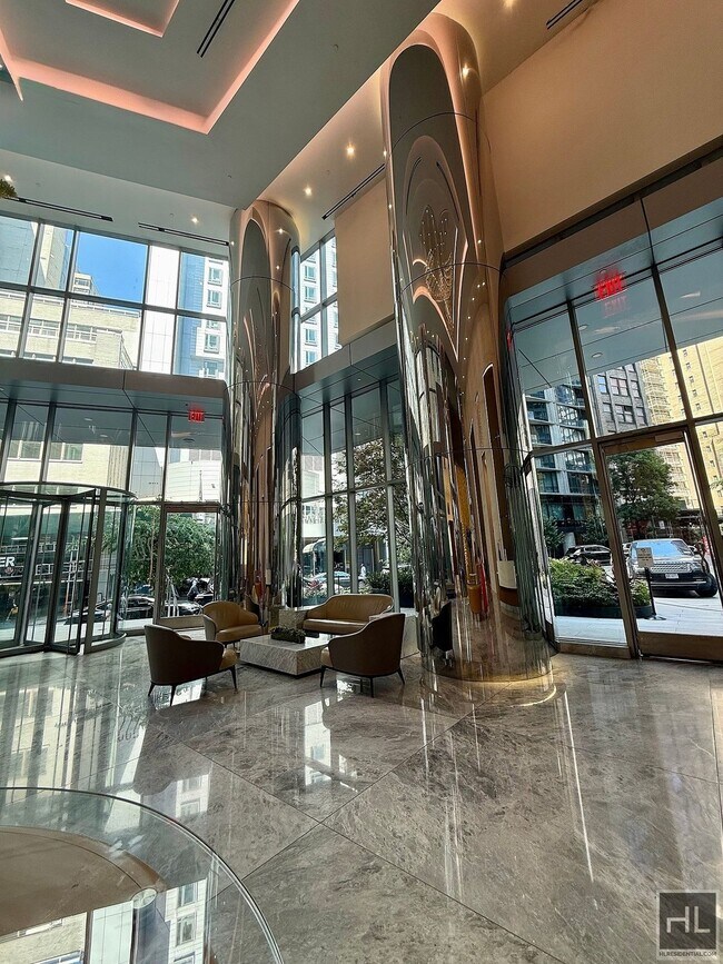 Building Photo - SUNNY NO FEE STUDIO IN THE LUXURY SUMMIT NYC