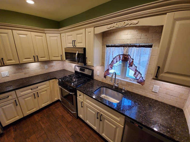 Over head and countertop lighting stone backs - 78 S Carll Ave