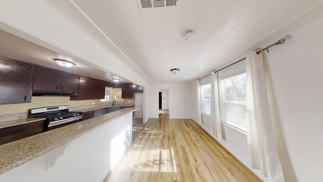Building Photo - Fresh 3BR/2BA • Pet Friendly • Garage • Mo...