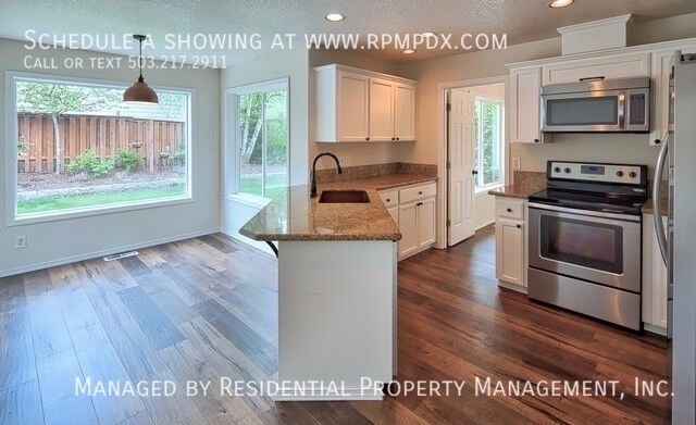 Building Photo - 23992 SW Red Fern Dr