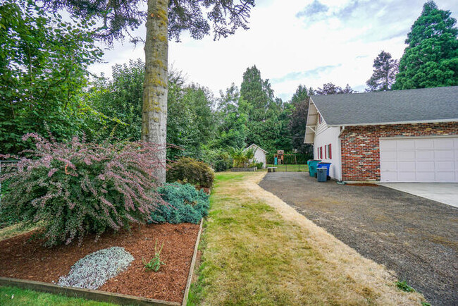 Building Photo - BEAUTIFUL LANDSCAPED THREE BEDROOM WITH BO...