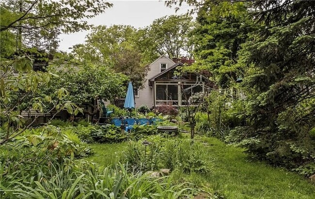 Building Photo - Storybook Bungalow with Beautiful Grounds