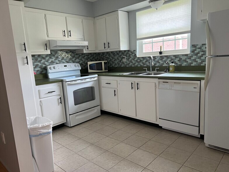 Another view of light and bright kitchen. - 3535 41st Ter S