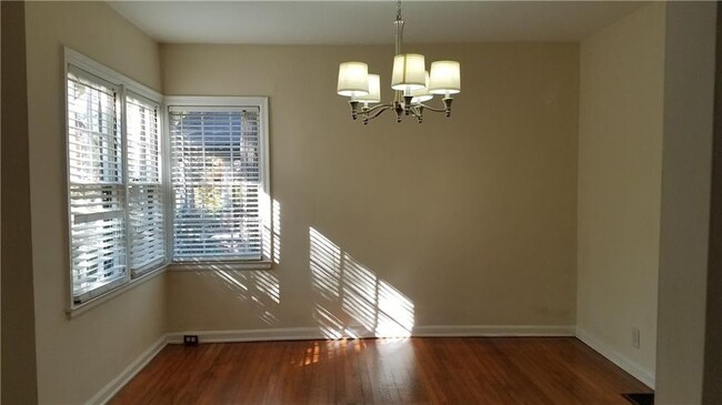 Separate dining room with 3 windows - 802 S Candler St