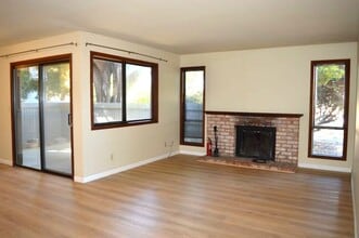 Building Photo - Spacious and Conveniently Located with Private Patio and Parking