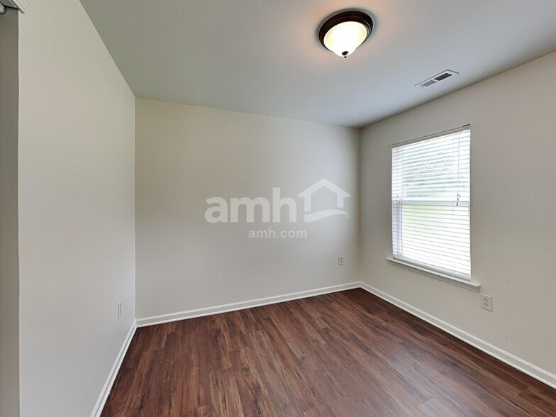 Building Photo - 8127 Deodora Cedar Ln
