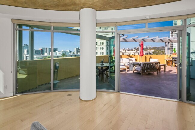 Building Photo - SPECTACULAR SKYLINE SANCTUARY | Unrivaled 1,480+ SF Terrace in Cortez Blu