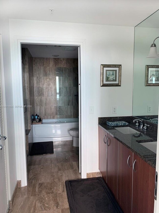 Building Photo - 300 S Biscayne Blvd