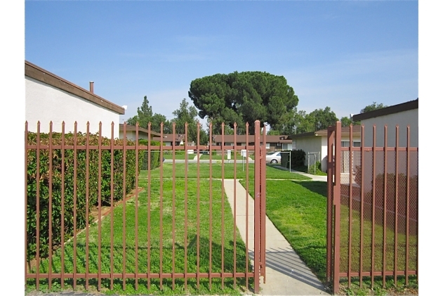 Gated entrance - Bouganviella Apartments