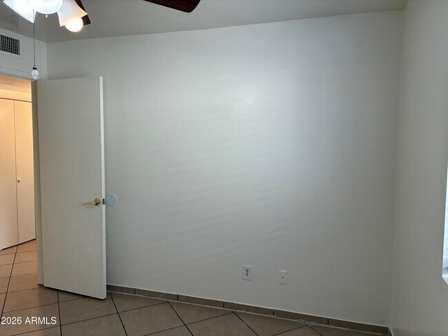 Building Photo - 8819 W Roma Ave