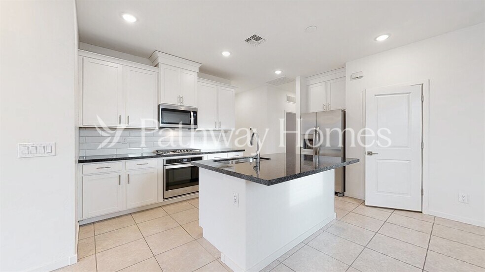 Building Photo - 40369 W Hillman Dr