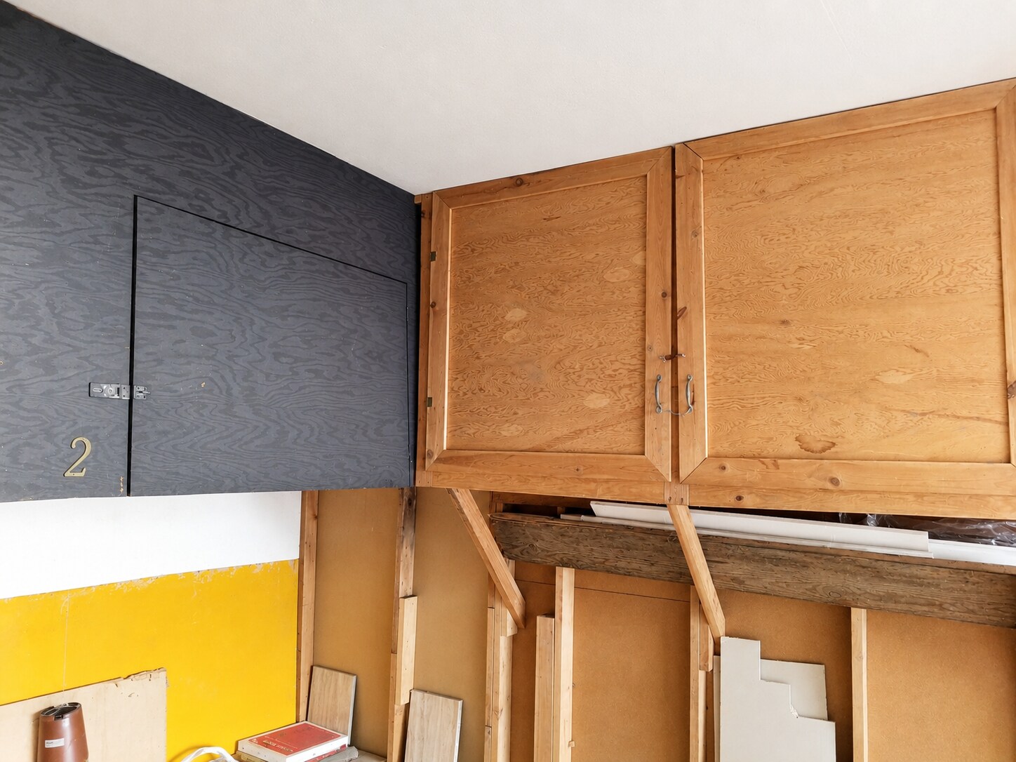 Garage includes built-in storage space and overhead cabinet areas. - 339 E Taft Ave