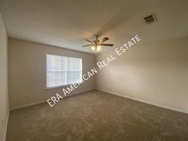 Building Photo - 7418 Woodmont Rd