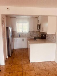 Building Photo - 7785 W 30th Ct