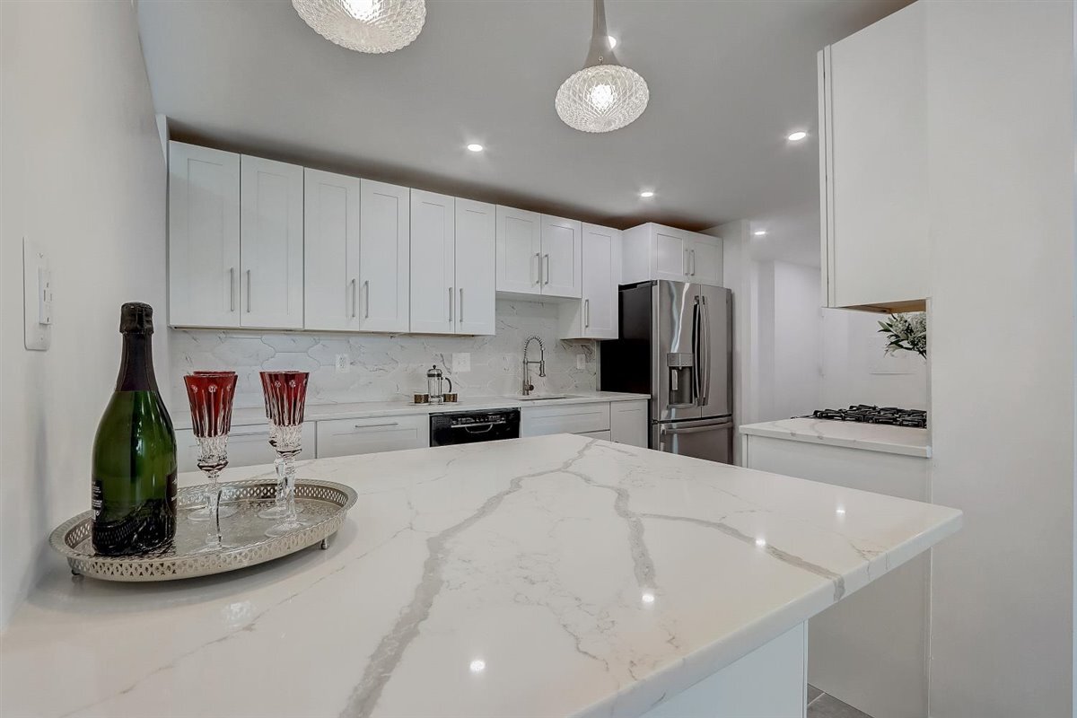 Gorgeous quartz countertop, design lighting. - 240 M St SW