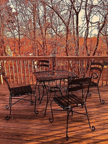 Sliding doors off kitchen open to tree top deck! - 20 Elm Ave