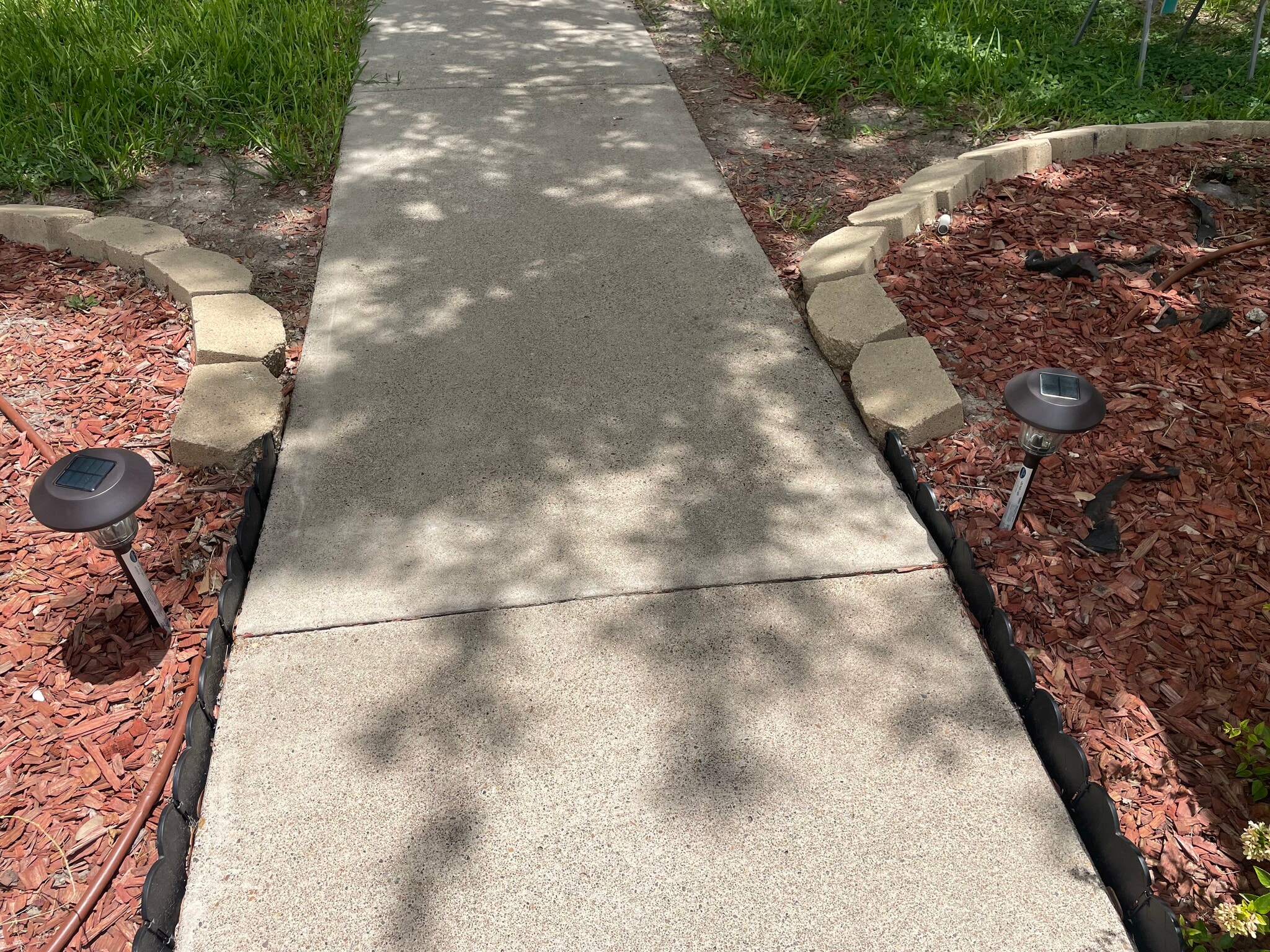 Solar lights on sidewalk to apt - 2607 Ringold Cir