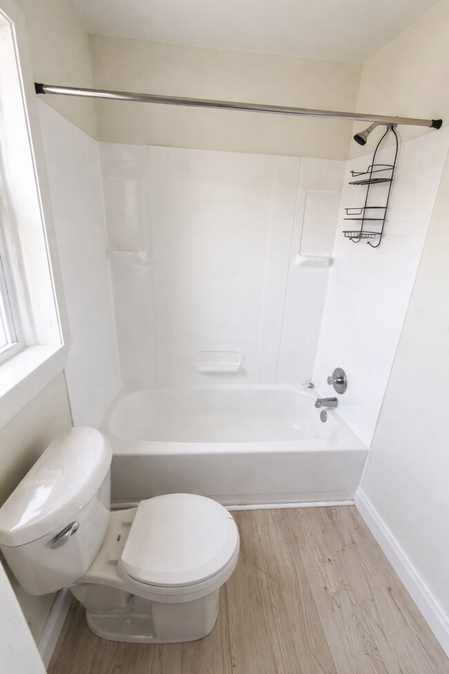 Building Photo - Renovated Home with Modern Kitchen, Basement & Natural Light