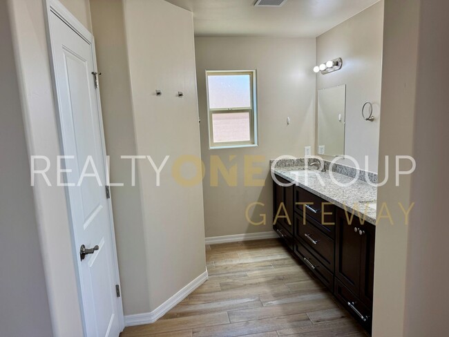 Building Photo - Enjoy those Arizona Sunset in this Three Bedroom Two Bath Home full of upgrades !!