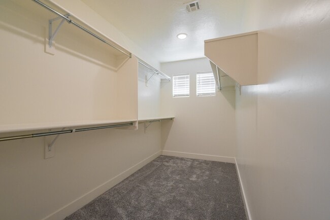 Building Photo - Modern 4-Bed Stand-Alone Home with Fenced Patio