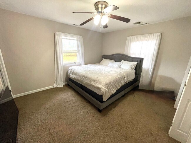 Building Photo - Spacious Home with Large Yard, Hot Tub, and More