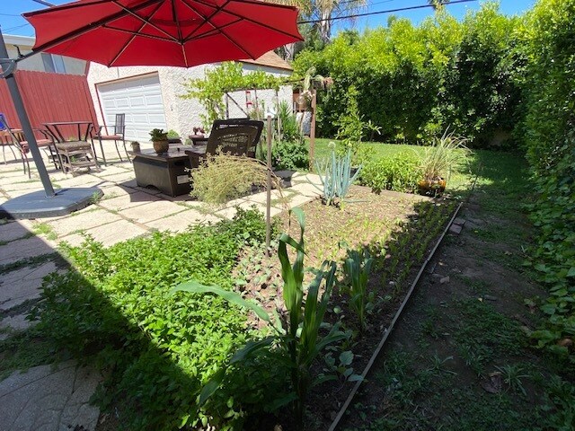 Organic garden in back yard - 1344 S Curson Ave