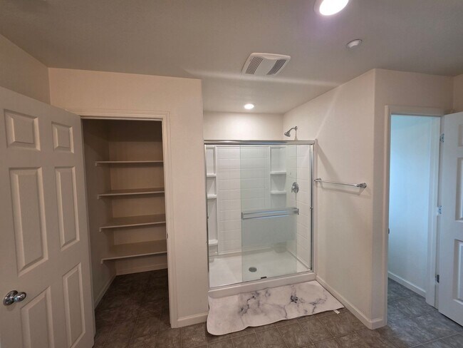 Building Photo - Spacious 5BR + Loft in Hamptons Village – Studio Suite, New HVAC, EV Charging