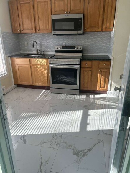 Updated flooring in kitchen - 24 Garden St