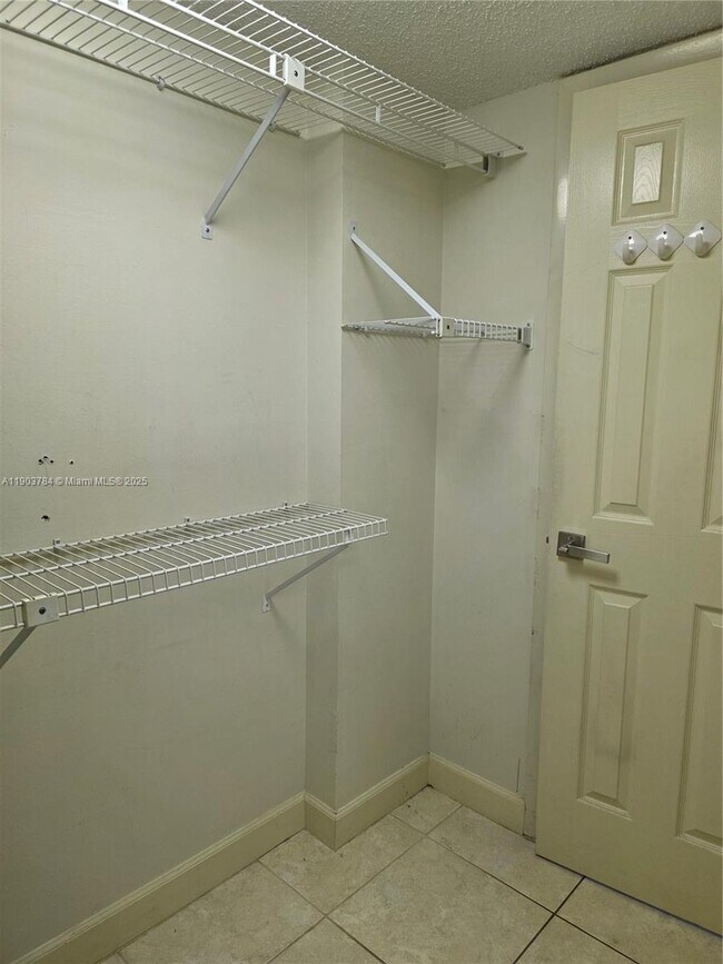 Building Photo - 9917 W Okeechobee Rd