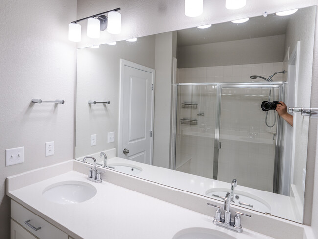 Oversized shower with shelving and a bench; off of primary bedroom - 2863 W 69th Ave