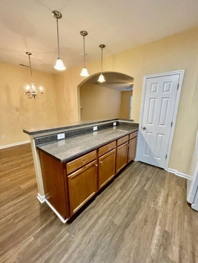 Building Photo - Come take a look at this end unit 3 bedroom, 2.5 bath townhouse located in very desirable FORT MI...