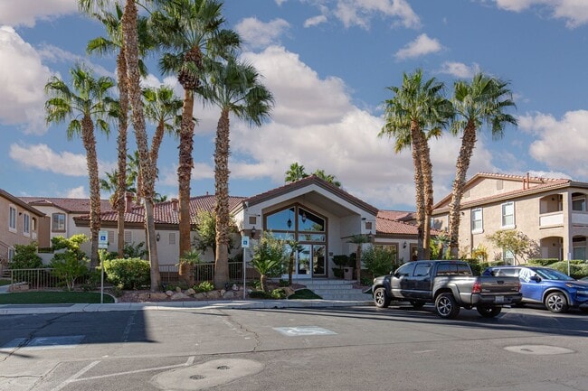 Building Photo - 1st floor unit with garage in gated Hender...