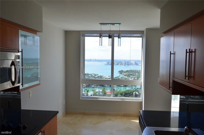 Building Photo - 2 br, 2 bath Condo - 6365 Collins Ave U N ...