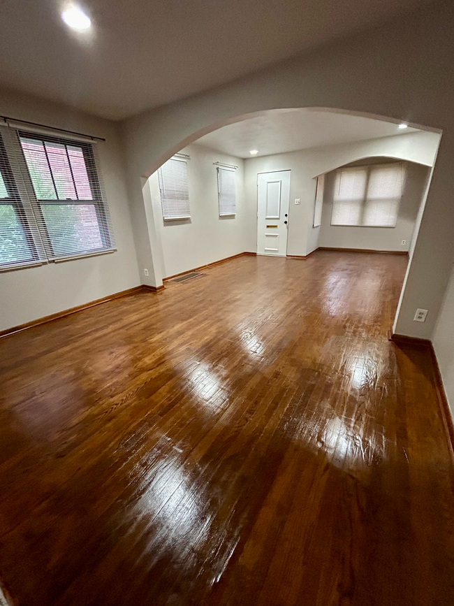 Polished wood floor - Open layout includes nook (perfect for desk) living & dining area) - 6516 Oleatha Ave