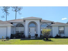 Building Photo - 4 Bedroom, 3 Bath Spacious House in Palm Coast, FL