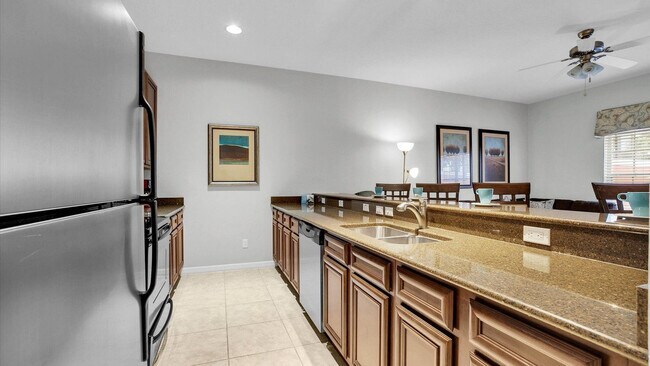 Building Photo - 8975 Majesty Palm Rd