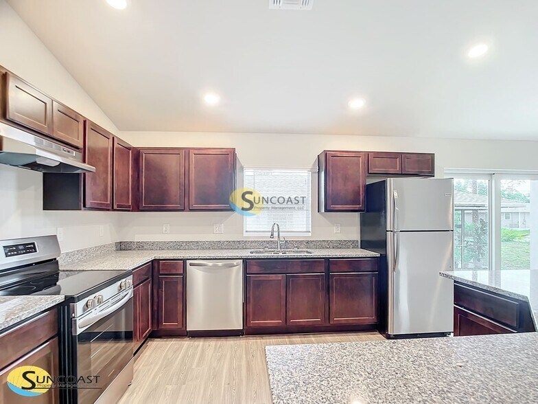 Building Photo - 7839 N Quibble Ave