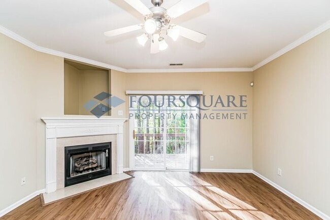 Building Photo - Spacious 2-Bed / 3.5-Bath Townhome with Hardwood Floors, Lower-Level Bonus Room & Private Outdoor...