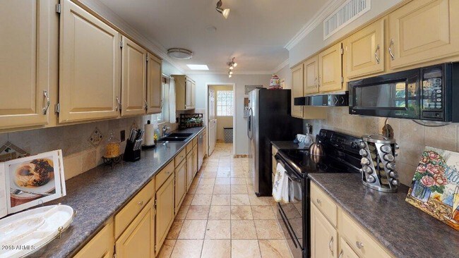Building Photo - 6231 E Rose Cir Dr