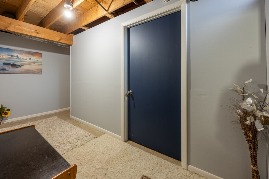 Entrance to laundry room/ 1/2 bathroom in basement - 2828 Saturn Ave