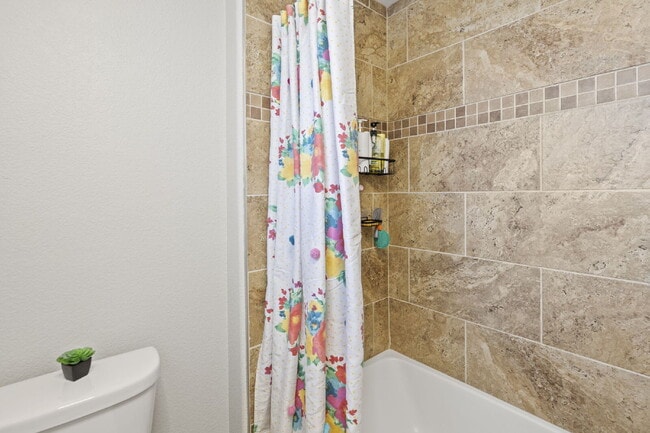 Building Photo - Spacious Home with Finished Basement, Granite Kitchen & Fenced Yard Near Fort Carson